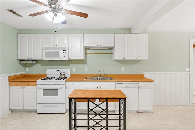 kitchen featuring ceiling fan, sink, white cabinets, and white appliances