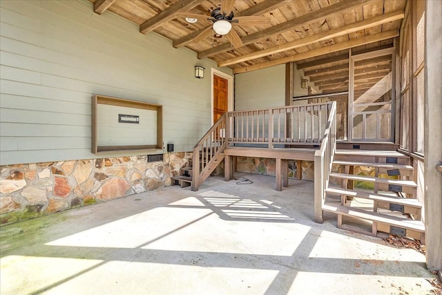 interior space with a patio and ceiling fan