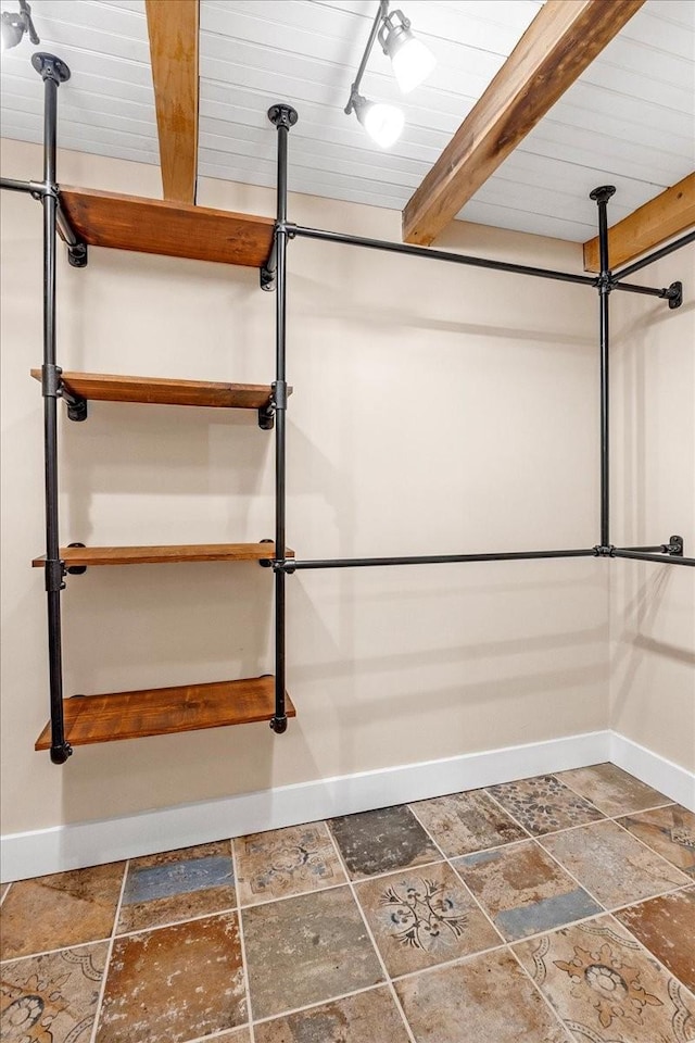 bathroom featuring wood ceiling and beam ceiling