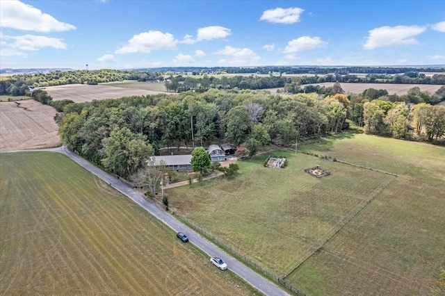 birds eye view of property featuring a rural view