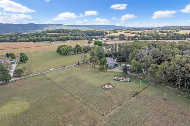 drone / aerial view featuring a rural view and a mountain view