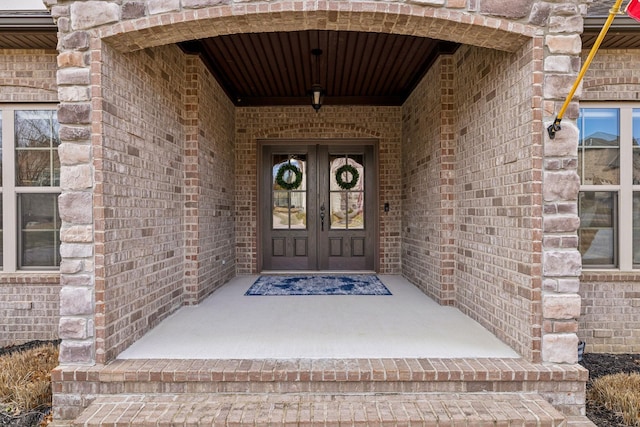 doorway to property with french doors