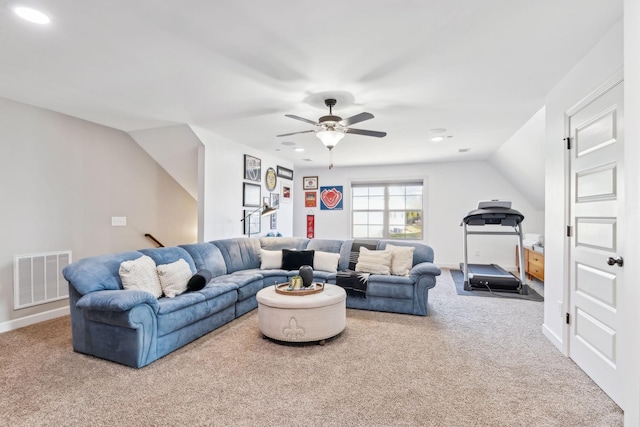 living room with lofted ceiling, carpet floors, and ceiling fan