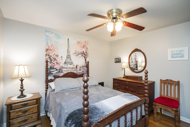 bedroom with wood finished floors and a ceiling fan