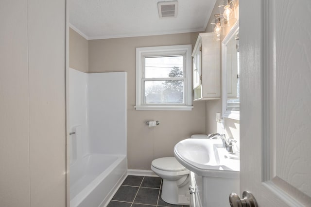 full bathroom with tile patterned floors, toilet, sink, a textured ceiling, and shower / tub combination