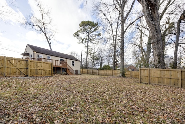 view of yard featuring a wooden deck