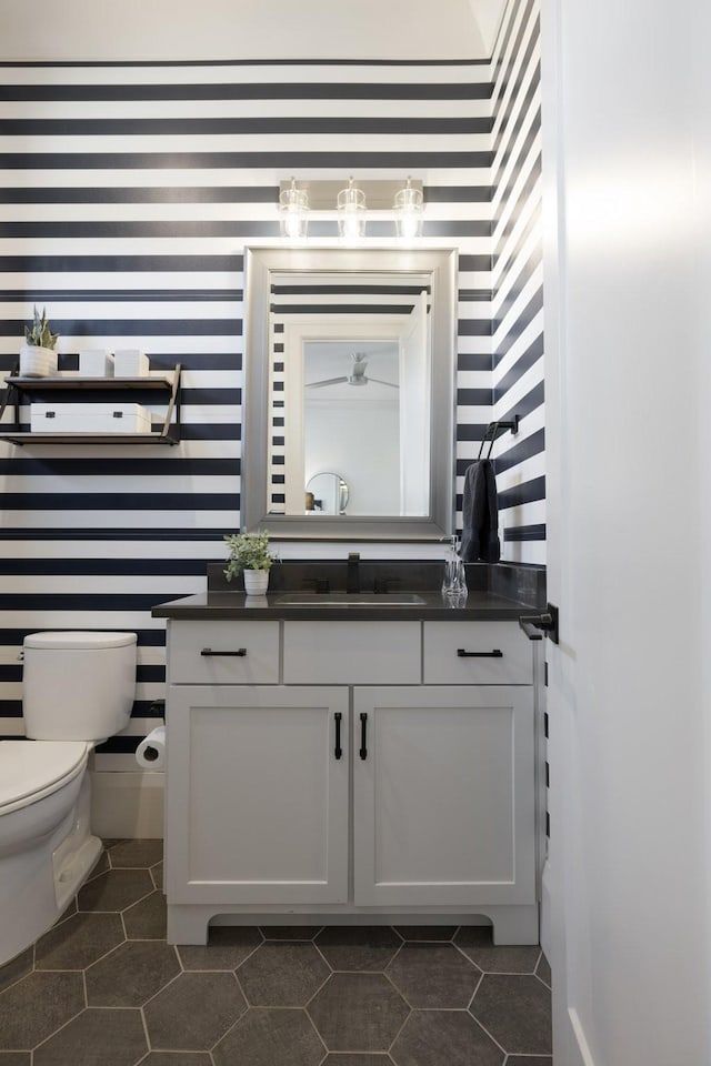 bathroom with vanity and toilet