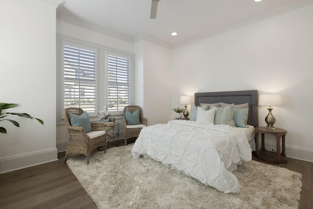 bedroom featuring dark hardwood / wood-style flooring and ceiling fan