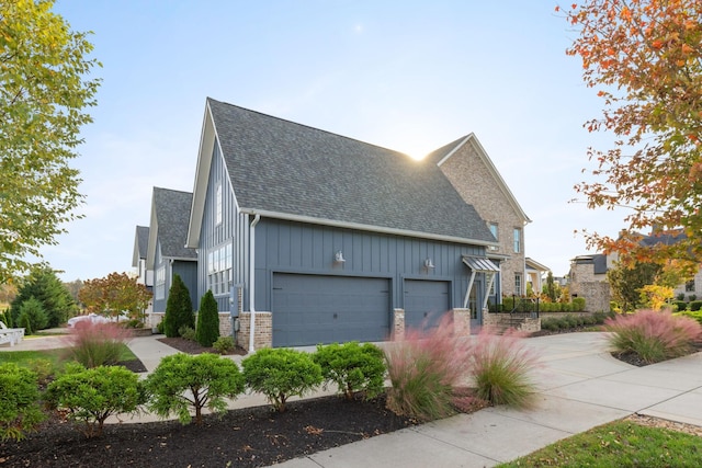 view of side of property featuring a garage