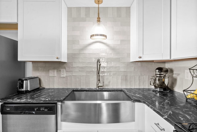 kitchen featuring white cabinetry, decorative backsplash, decorative light fixtures, and dishwasher