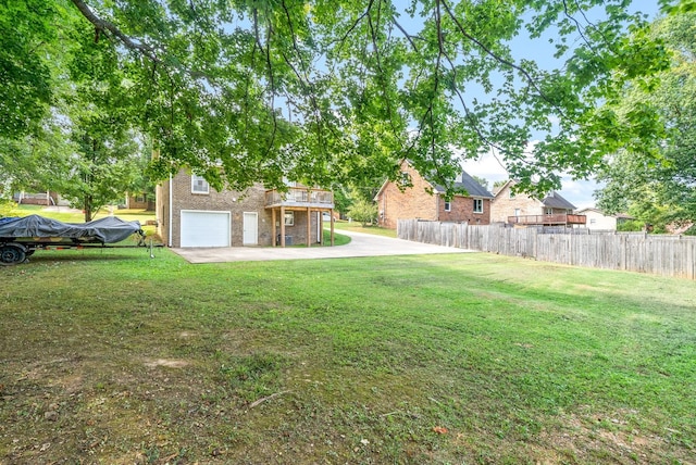 view of yard featuring a garage