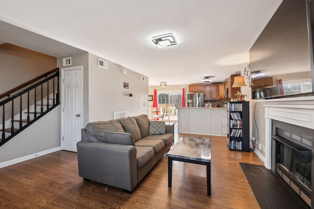 living room with hardwood / wood-style floors