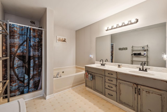 bathroom featuring vanity and shower with separate bathtub