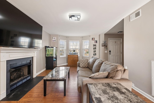 living room featuring dark hardwood / wood-style floors