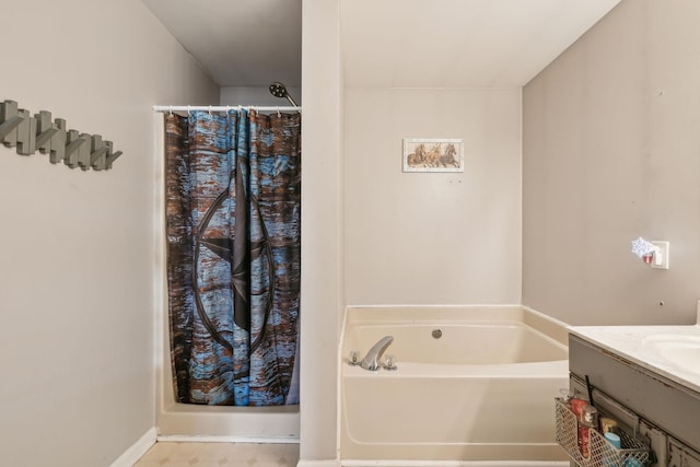 bathroom with vanity and independent shower and bath