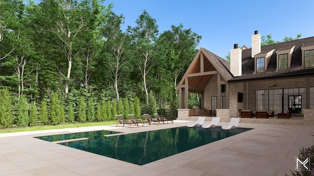 view of swimming pool featuring a patio area