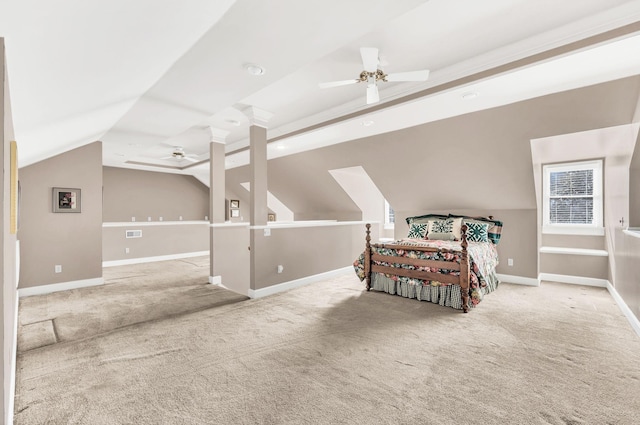 bedroom with ceiling fan, lofted ceiling, and light colored carpet