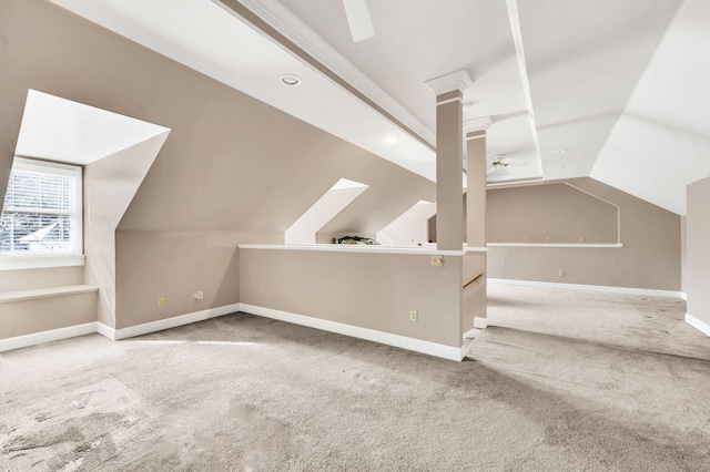 additional living space with vaulted ceiling, ceiling fan, and carpet floors