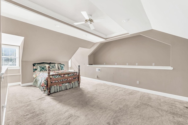 carpeted bedroom with lofted ceiling and ceiling fan