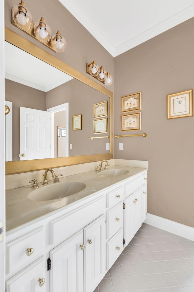 bathroom with tile patterned flooring, crown molding, and vanity