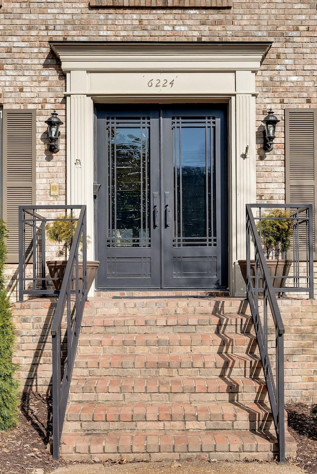 entrance to property featuring french doors