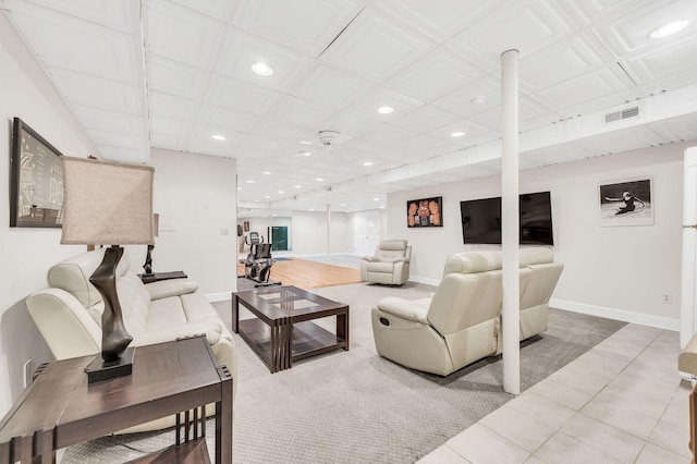 living room with tile patterned flooring