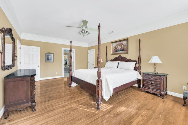 bedroom with connected bathroom, ornamental molding, ceiling fan, and light wood-type flooring