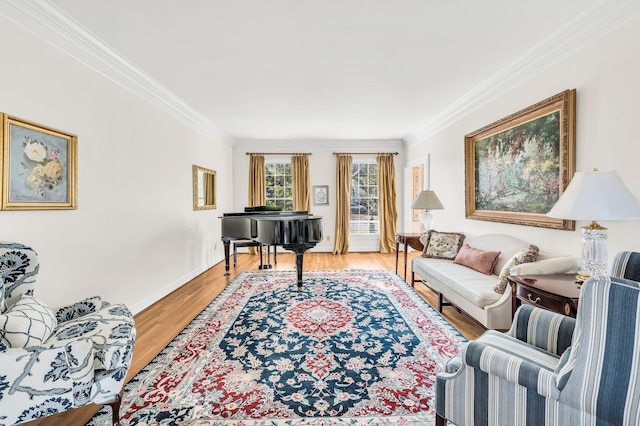 living room featuring ornamental molding and light hardwood / wood-style flooring