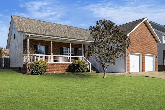 view of front facade featuring a porch, a garage, and a front yard