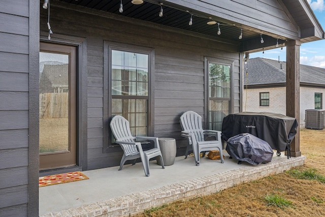 view of patio / terrace featuring cooling unit and grilling area