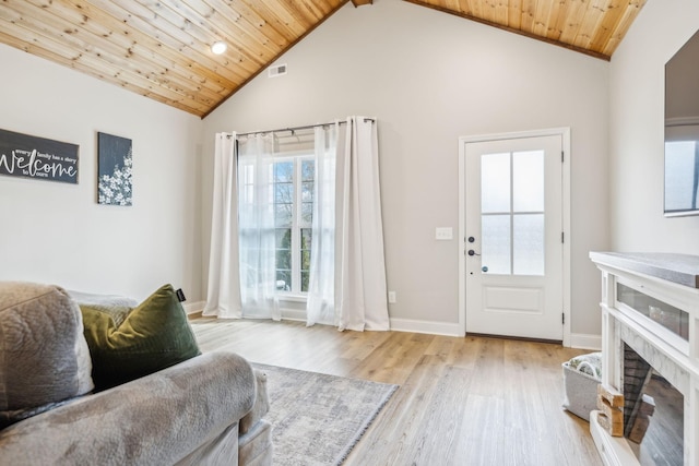 living room with beam ceiling, wooden ceiling, high vaulted ceiling, and light hardwood / wood-style flooring