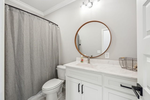 bathroom featuring crown molding, vanity, and toilet