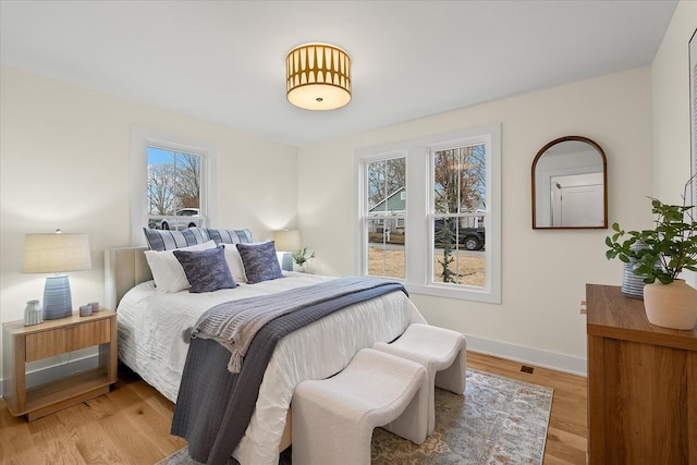 bedroom featuring light hardwood / wood-style floors