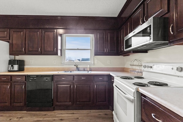 kitchen featuring dishwasher, dark brown cabinets, sink, and white electric range