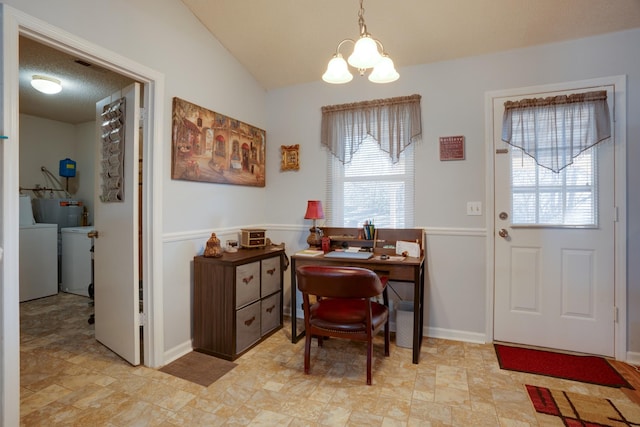 office featuring vaulted ceiling, washer / dryer, and a notable chandelier