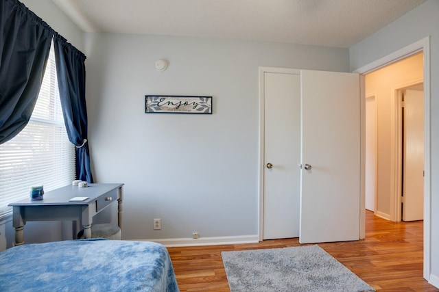 bedroom featuring light wood-type flooring