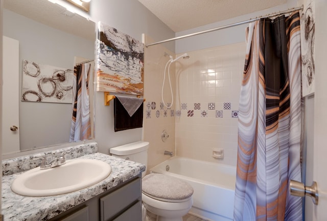 full bathroom featuring vanity, toilet, shower / tub combo, and a textured ceiling