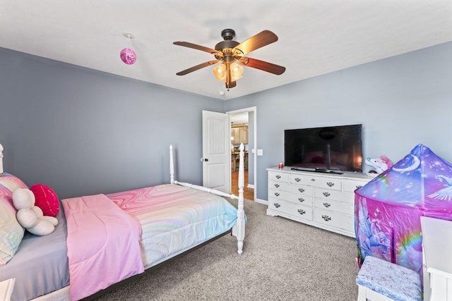 carpeted bedroom featuring ceiling fan