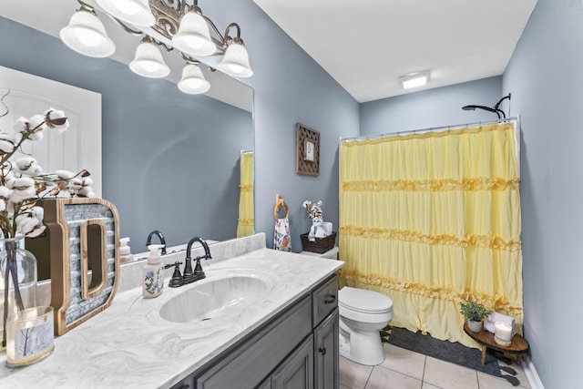 full bathroom featuring shower / bath combination with curtain, vanity, toilet, tile patterned floors, and an inviting chandelier