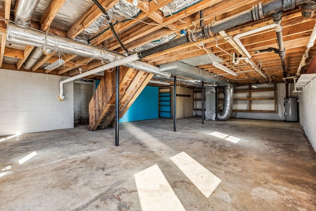 unfinished below grade area with water heater and stairway