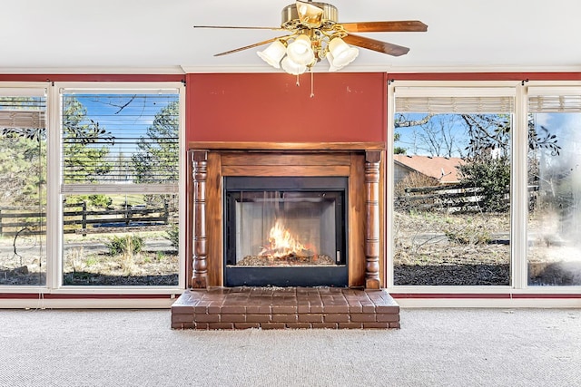 interior details with carpet and a fireplace