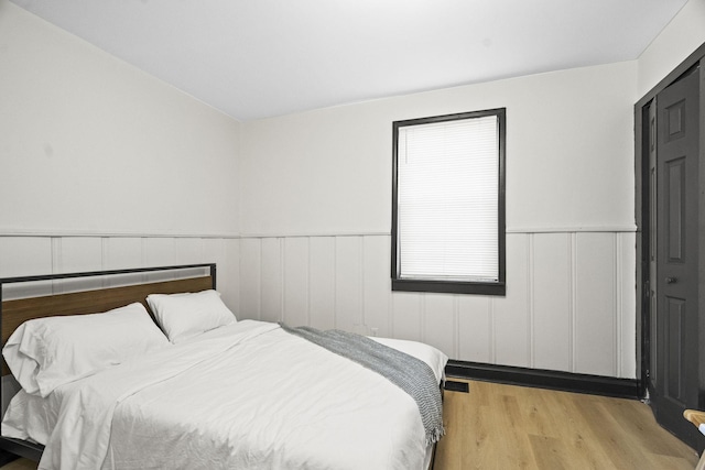 bedroom featuring light wood-type flooring