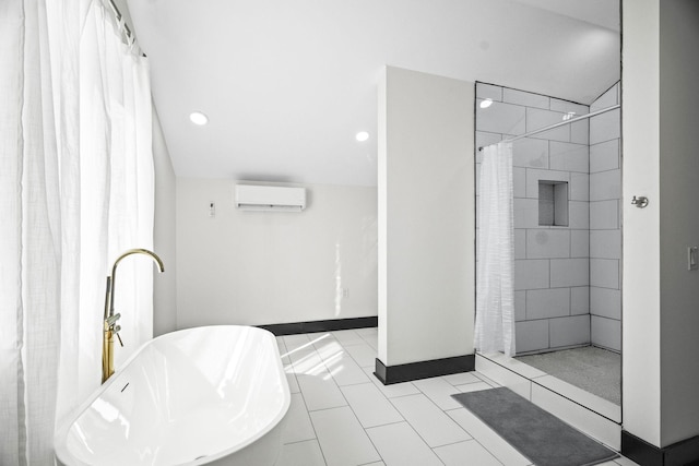 bathroom featuring tile patterned flooring, independent shower and bath, and a wall mounted AC