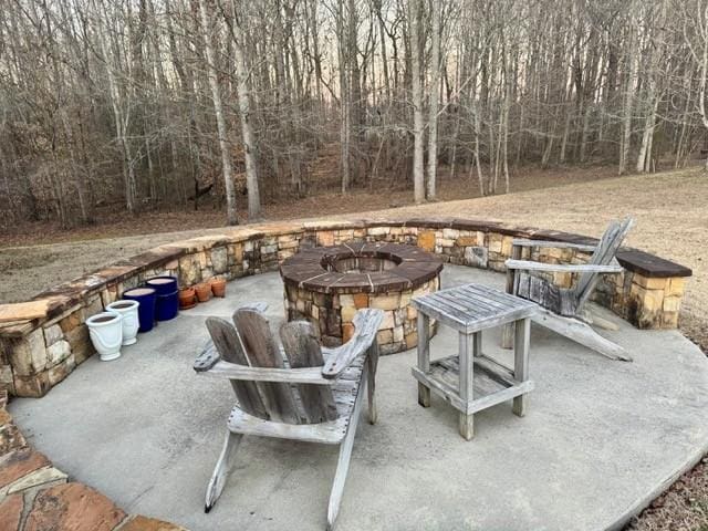 view of patio / terrace with a fire pit