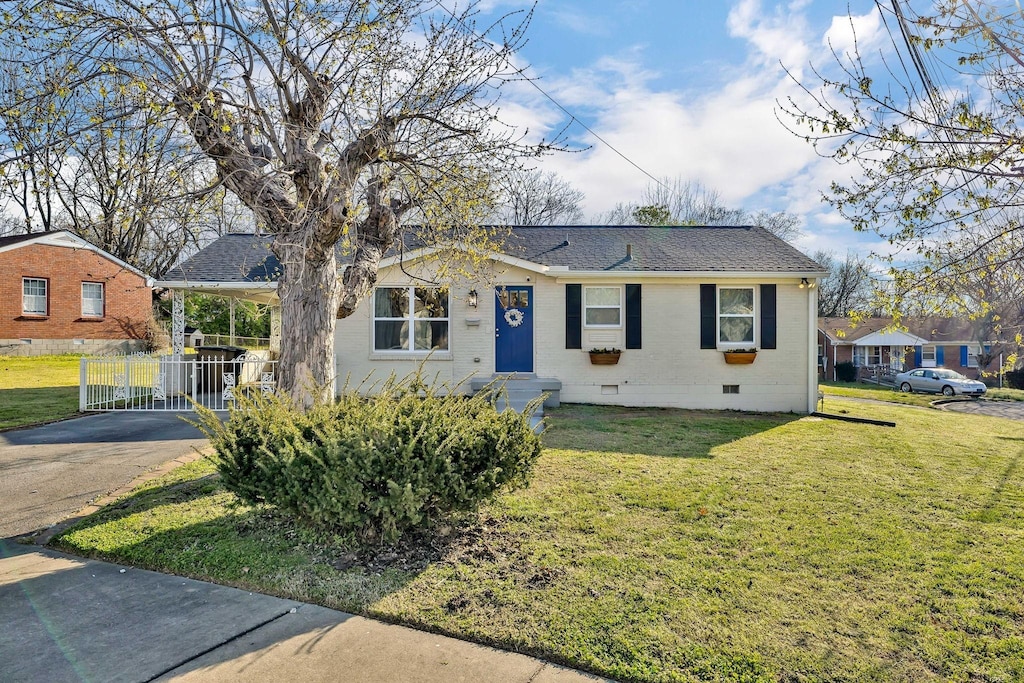 view of front of home with a front yard