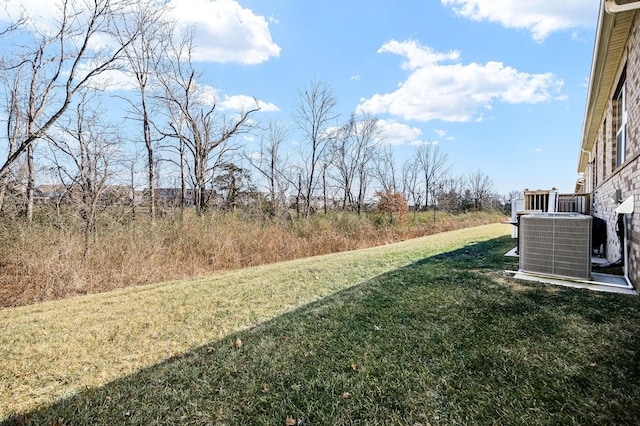 view of yard featuring central AC unit