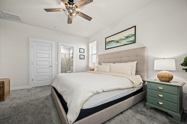 carpeted bedroom with ceiling fan and ensuite bath