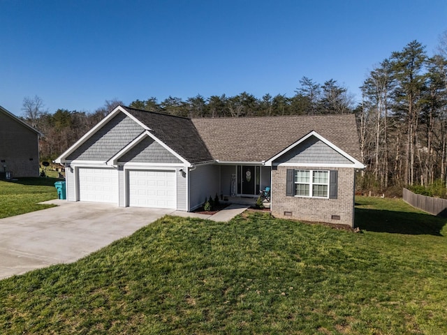 view of front of property with a garage and a front lawn