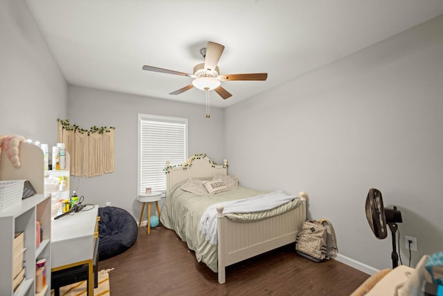 bedroom featuring dark wood-type flooring and ceiling fan