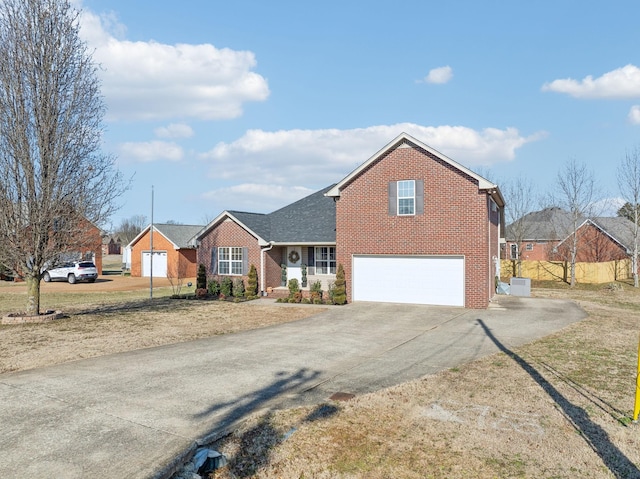 front of property featuring a garage and a front lawn